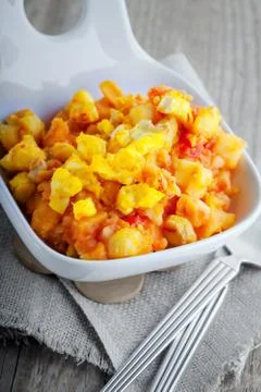 Stewed cod and vegetables Stock Photos