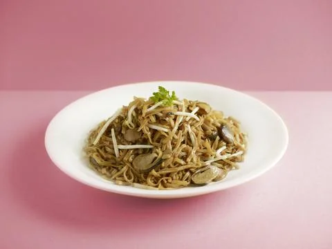 Stewed Ee-Fu Noodles with Assorted Seafood served in a dish isolated on cutti Stock Photos