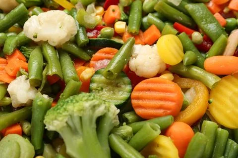 Stewed mixed vegetables as background, closeup Stock Photos