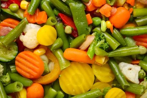 Stewed mixed vegetables as background, closeup Stock Photos