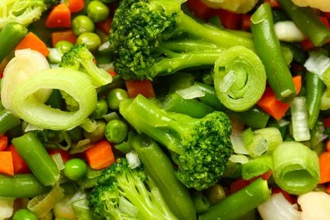 Stewed mixed vegetables as background, closeup Stock Photos