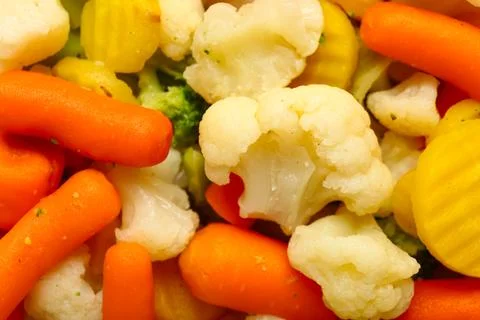 Stewed mixed vegetables as background, closeup Stock Photos
