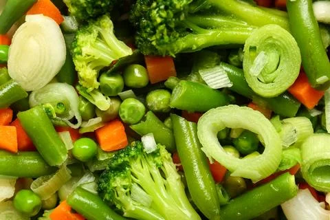 Stewed mixed vegetables as background, closeup Stock Photos