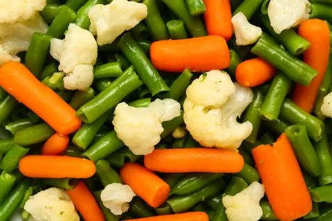 Stewed mixed vegetables as background, closeup Stock Photos