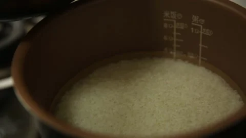 Stewed rice in pressure cooker (2) Stock Footage 202234396
