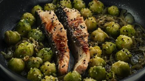 Stewed salmon with Brussels sprouts Foto stock