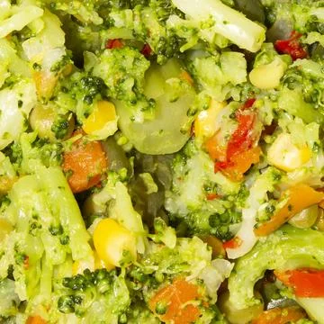 Stewed vegetable mixture.Cauliflower, string beans, carrots, peas and spices. Stock Photos