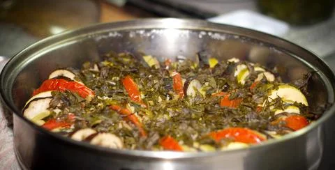 Stewed vegetables with greens Stock Photos