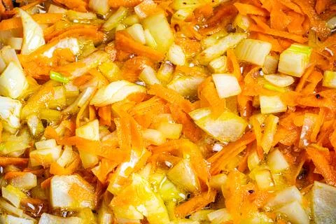 Stewed vegetables in a pan. Cooking process. Vegan food. Foto stock