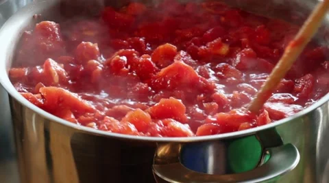 Stewing a large batch of tomatoes for canning Stock Footage 41472726