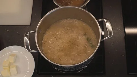 Stewing rice in wine overhead Stock Footage 112127553