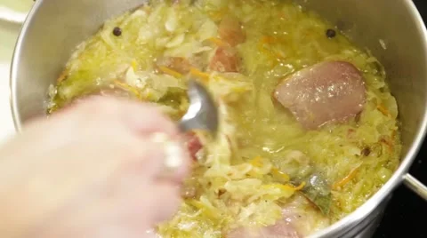 Stewing vegetables and meat Stock Footage 49783740