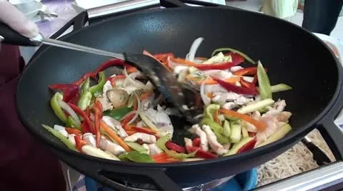 Stewing vegetables with chicken Stock Footage 18008359