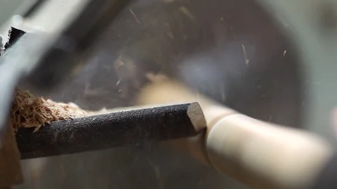 Stick being shaped by a machine to prepare polo stick Stock Footage 72983747