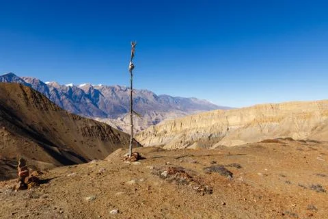 Stick indicating the highest point of the pass Stock Photos