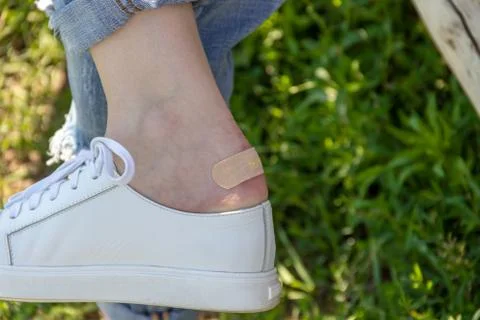 Stick a patch of corn on the leg. Stock Photos