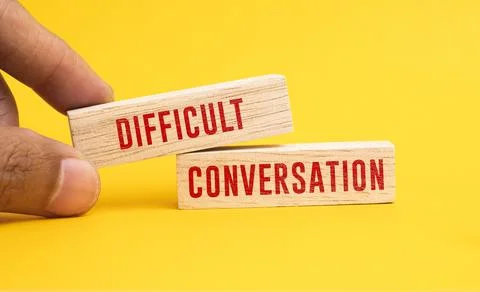 Stick with the word DIFFICULT CONVERSATION. difficult concept of conversation Stock Photos
