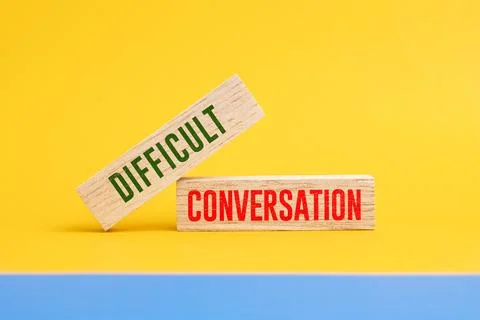 Stick with the word DIFFICULT CONVERSATION. difficult concept of conversation Stock Photos