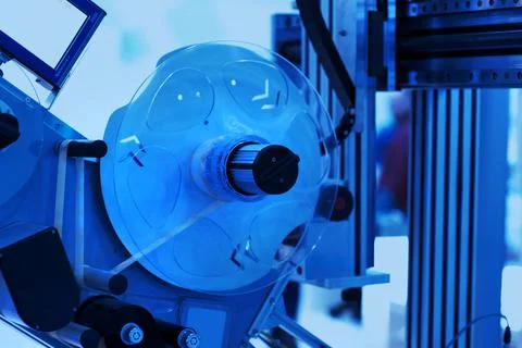 Sticker label printer. Barcode digital printer and applicator machine. Stock Photos