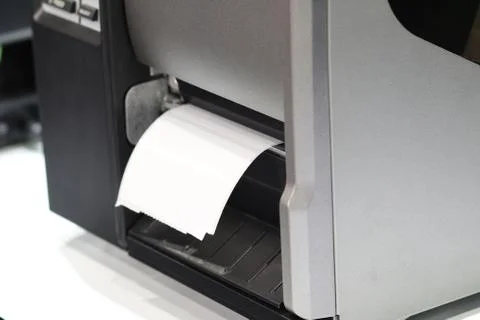 Sticker label printer for barcode Stock Photos