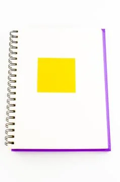 Sticker note on notebook Stock Photos