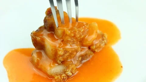 Sticking crispy pork with fork , in studio Chiangmai Thailand. Stock Footage 151432333