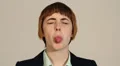 Sticking out tongue with attitude, brat, spoiled brat, spoilt brat HD Footage