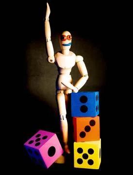 Stickman On Stage With Dice Stock Photos
