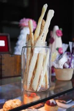 Sticks of bread placed in a jar at a bakery Stock Photos