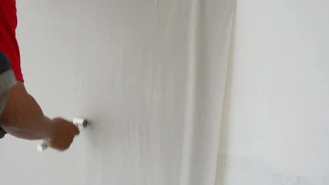 Sticks wallpaper on the wall at home. Stock Footage 123713484