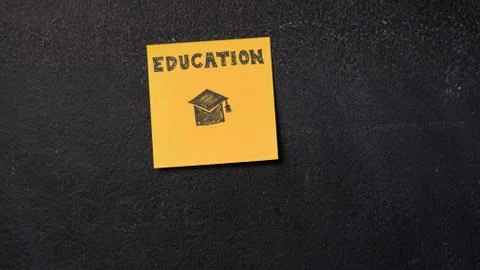 Sticky note on the blackboard Stock Photos
