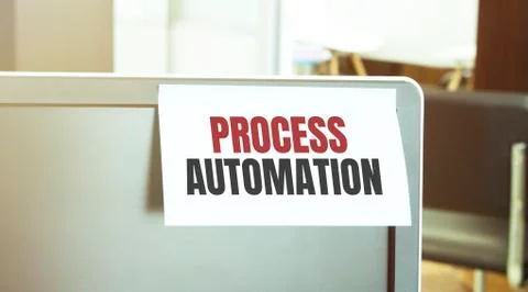 Sticky note on the computer. Text PROCESS AUTOMATION Stock Photos