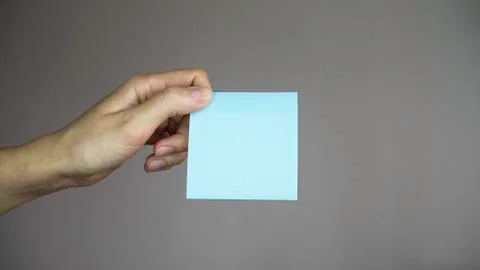 Sticky note with in a hand. Foto stock