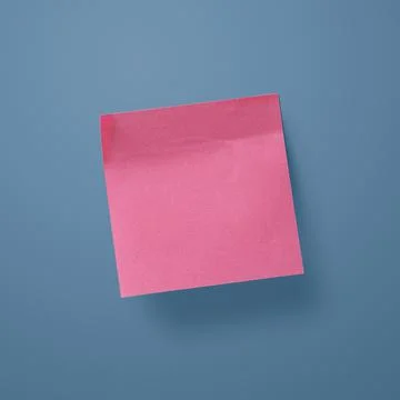 Sticky note hanging on a wall Stock Photos