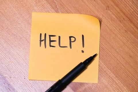 Sticky note with help Stock Photos