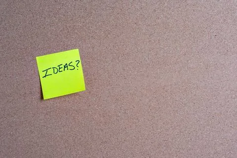 Sticky Note with Ideas on a Corkboard Stock Photos