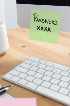 Sticky Note with Login Credentials on a Computer Screen Representing Securi.. Foto stock