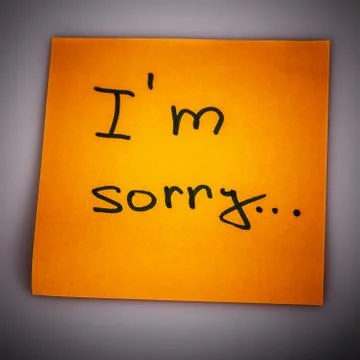 Sticky Note Message isolated on white - I am sorry Fotos de archivo