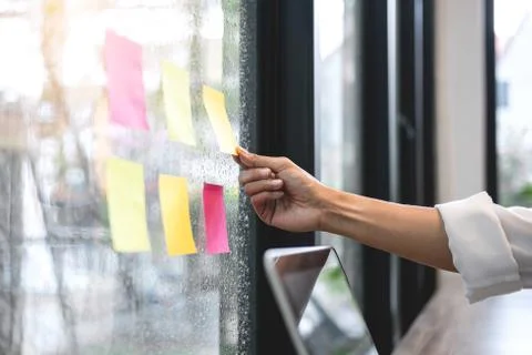 Sticky note paper reminder schedule board, Business woman accountant working Stock Photos