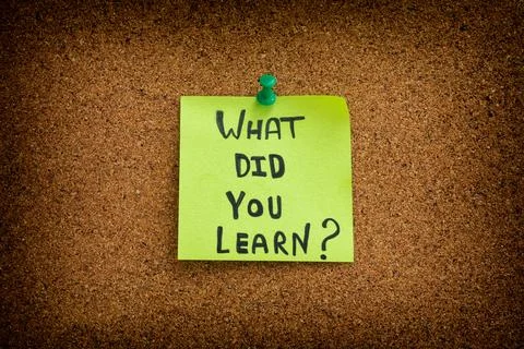 A sticky note with the question what did you learn written on it Stock Photos