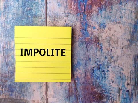 Sticky note with the word IMPOLITE Stock Photos