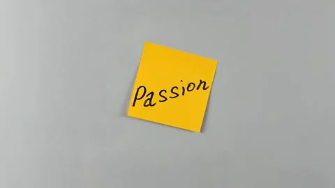 Sticky note with word Passion written on it, pinned on white background Stock Footage 305329722