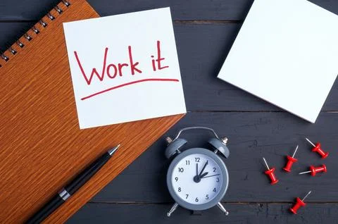 Sticky note with word Work it. Office workplace. Stock Photos