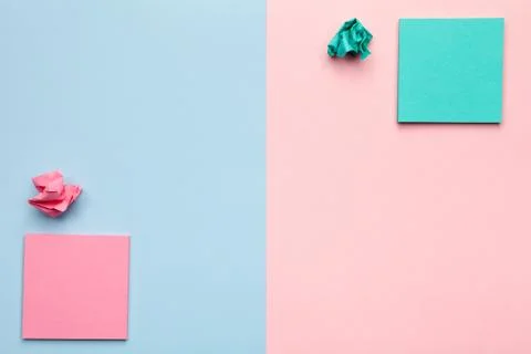 Sticky Notes with Crumbled Paper Balls on Pastel Background Stock Photos