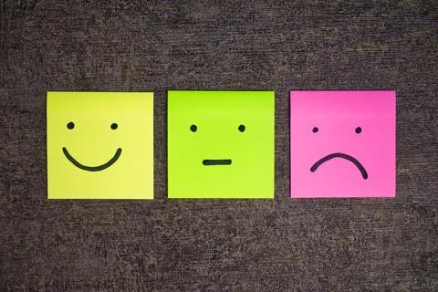 Sticky notes with emotion faces Stock Photos