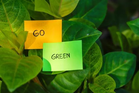 Sticky notes with garden background, go green concept Stock Photos