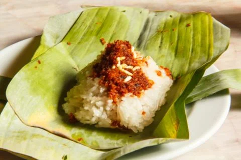 Sticky rice is a core component of the page made from shrimp, and coconut. Stock Photos