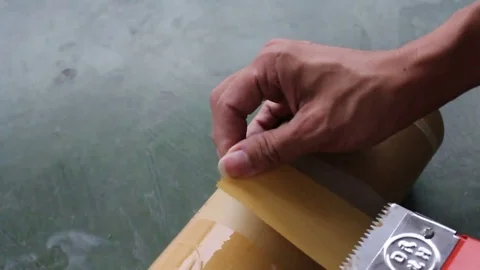 Sticky tape and man Stock Footage 78251316