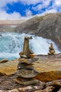 Stigfossen waterfall and stones stack - Norway Stock Photos