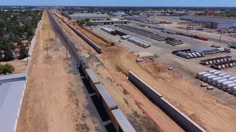 Still Aerial Drone Shot, Train Passing CA High Speed Rail, Fresno Stock Footage 340602647